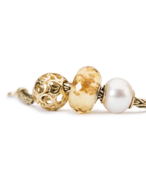 Baltasis Perlas, Auksas